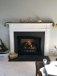 new vent free gas logs installed in a prefab fireplace in Virginia Beach, VA.