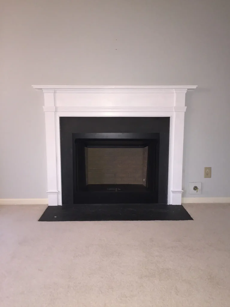 New prefab fireplace with slate trim in Chesapeake, VA