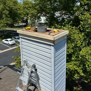 Chimney leak repair specialists in Newport News sealing flashing and crown joints
