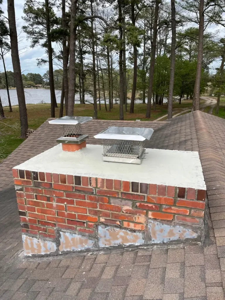 Chesapeake home with masonry chimney crown repair completed to prevent water intrusion and freeze-thaw damage.