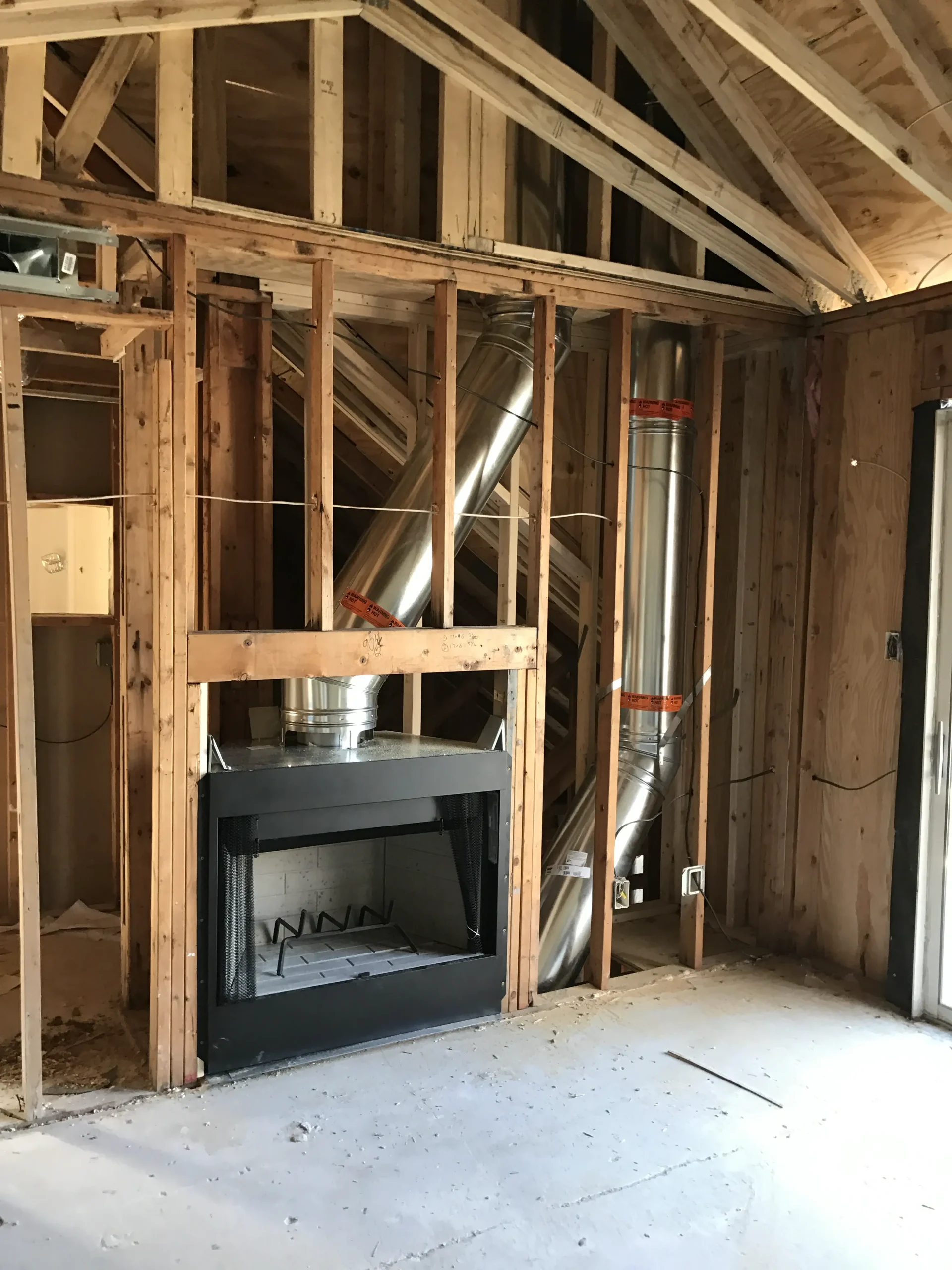 wood burning fireplace and new chimney installation