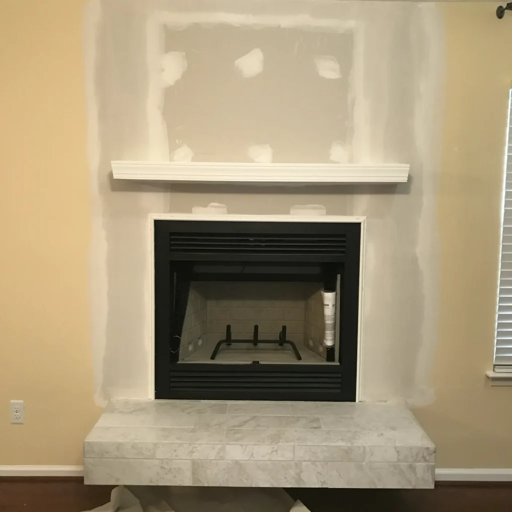 wood burning fireplace installation by Premier Chimney and Roofing.