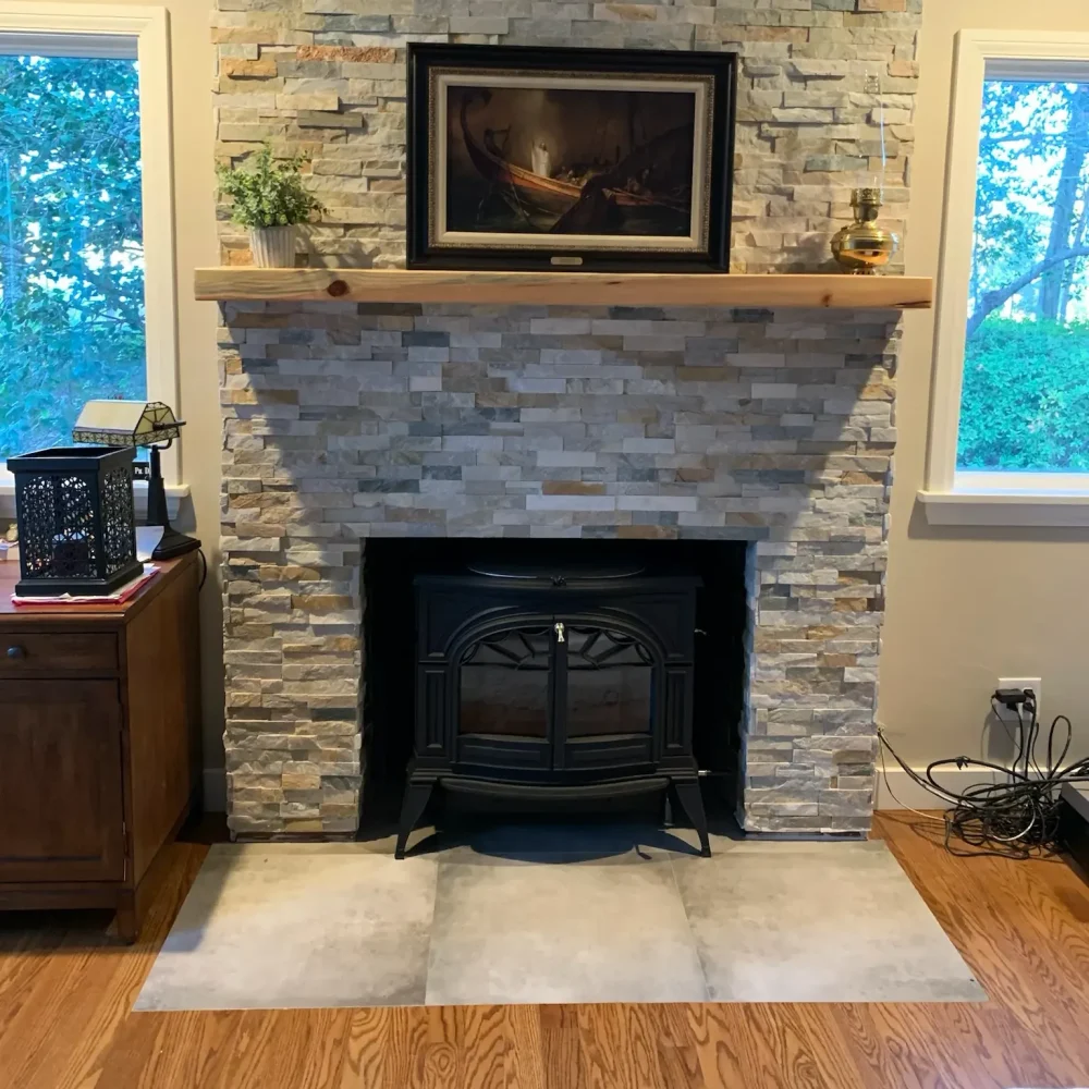 Wood stove installation in Virginia Beach by Premier Chimney and Roofing.