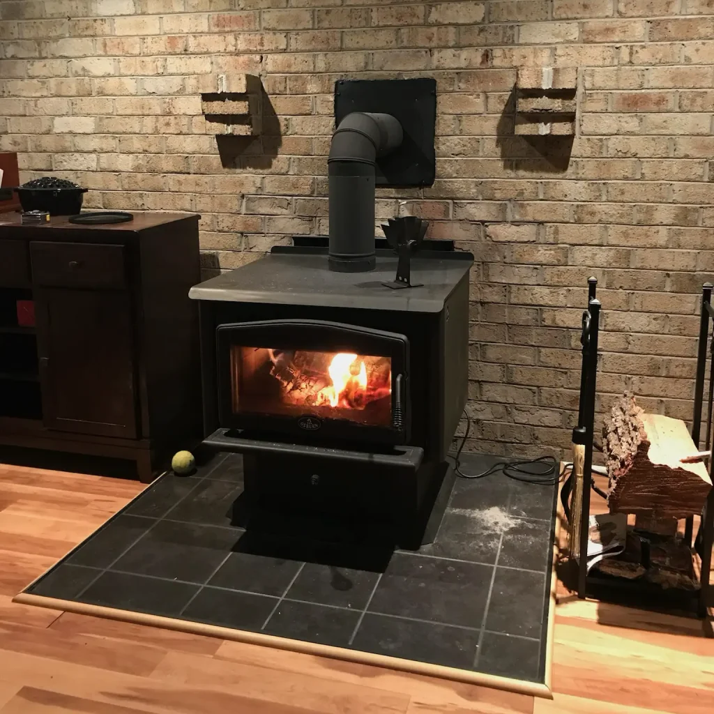 Wood stove installation in Virginia Beach by Premier Chimney and Roofing.
