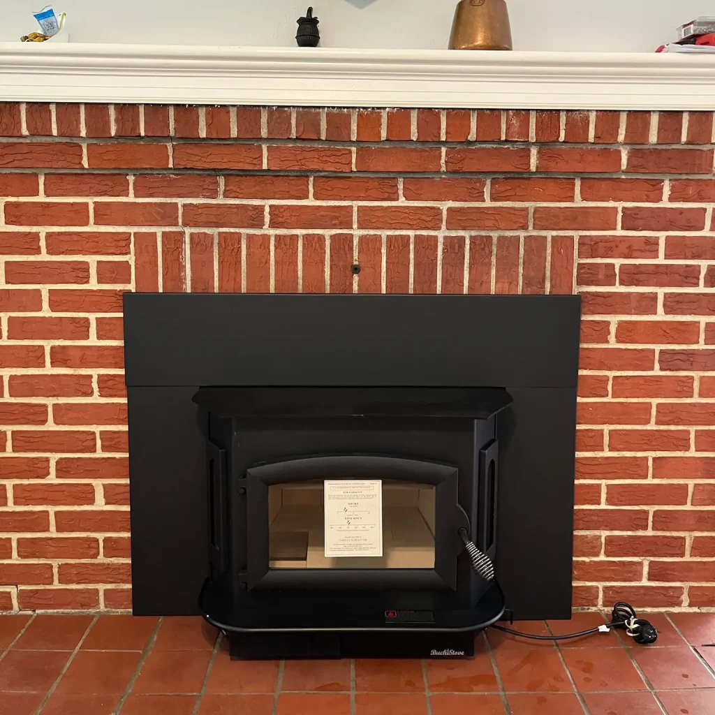 Wood stove installation in Virginia Beach by Premier Chimney and Roofing.