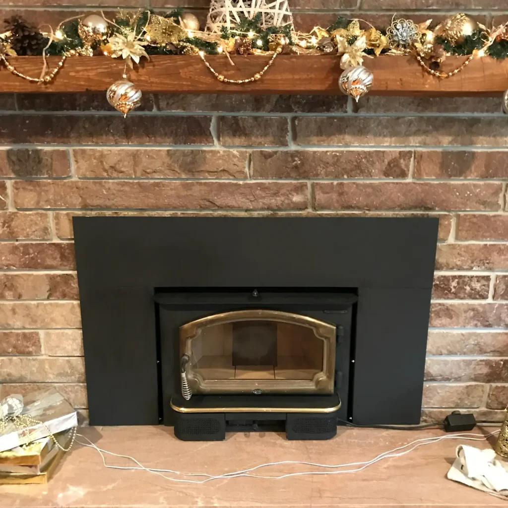 Wood stove installation in Virginia Beach by Premier Chimney and Roofing.