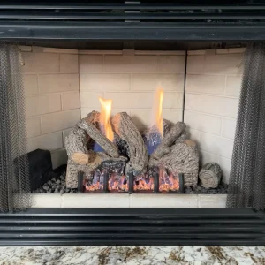 Gas fireplace in Newport News, VA after a professional repair, featuring clean, steady flames and fully operational burner assembly.