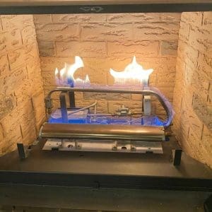 Testing the main burner on a gas fireplace in Hampton.