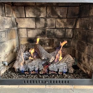 New gas logs in a gas fireplace in Chesapeake.