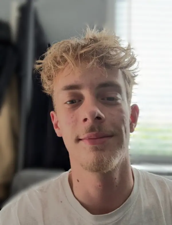 CSIA Certified Chimney Sweep and NFI Certified Gas Specialist Justin Swift of Premier Chimney and Roofing servicing gas fireplaces in Virginia Beach.