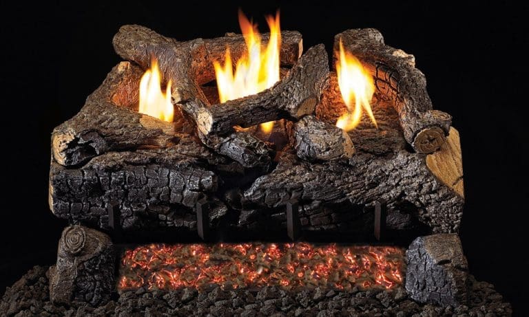 Real Fyre vent-free Evening Fyre Charred gas log set with glowing ember bed, hand-charred detailing, and tall golden flames creating a realistic wood-burning fire effect.